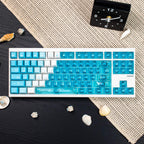 Full view of custom Cherry profile Deep Sea Blue 35-key PBT keycap set by Taptempo, budget-friendly mechanical keyboard upgrade with shipping to US and EU.